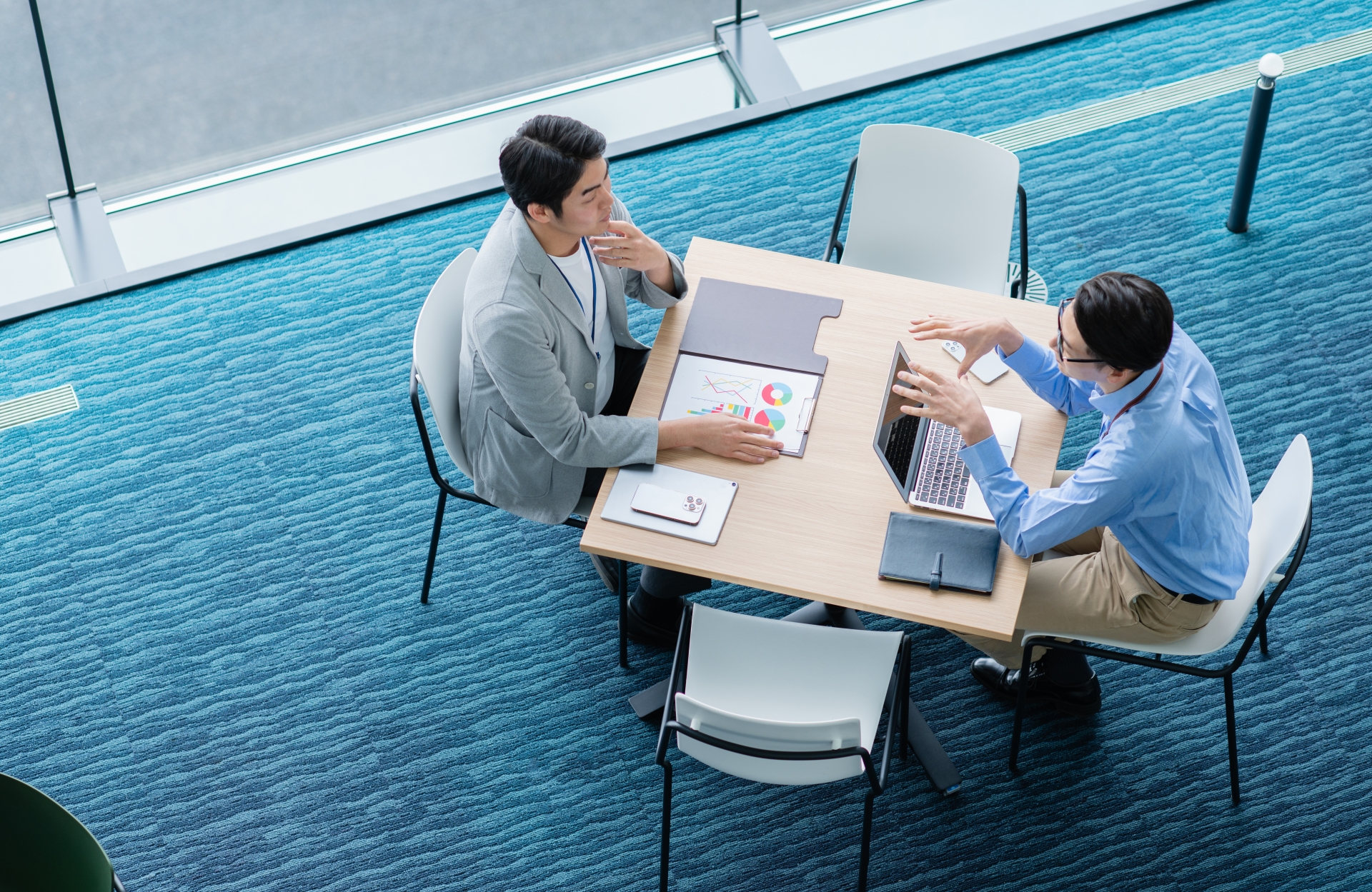 Business professionals analyzing growth charts